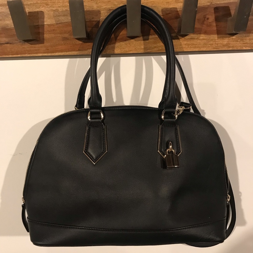 Hilary Radley purse with me  a gold lock adornment
